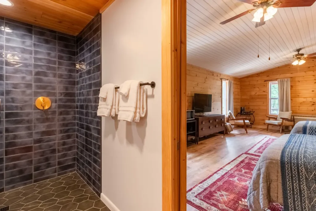 Bathroom entrance and room transition inside Garden Studio B at The Shaded Crest in Lake Lure, North Carolina