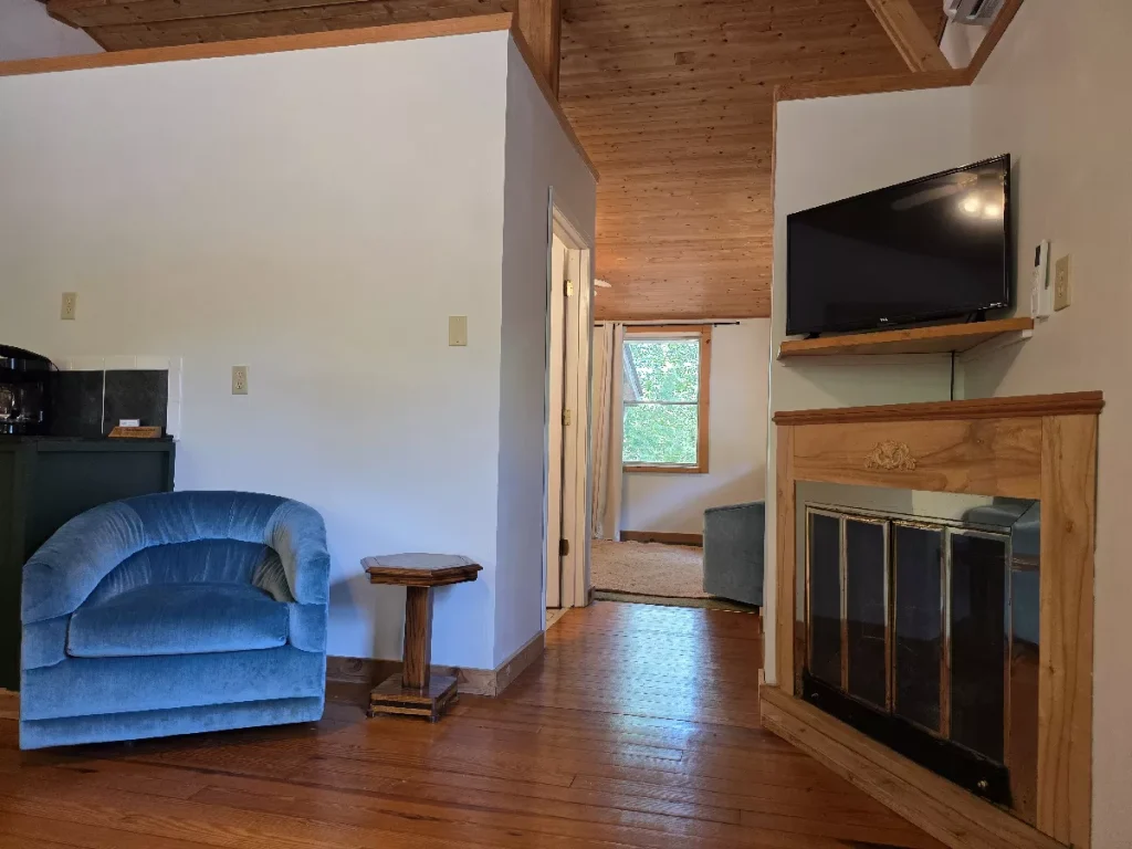 Coffee bar and blue chair inside The Haven cottage at The Shaded Crest in Lake Lure, North Carolina