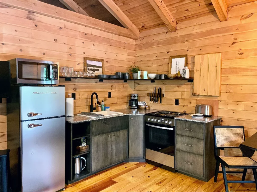 Full kitchen inside The Perch cabin at The Shaded Crest in Lake Lure, North Carolina